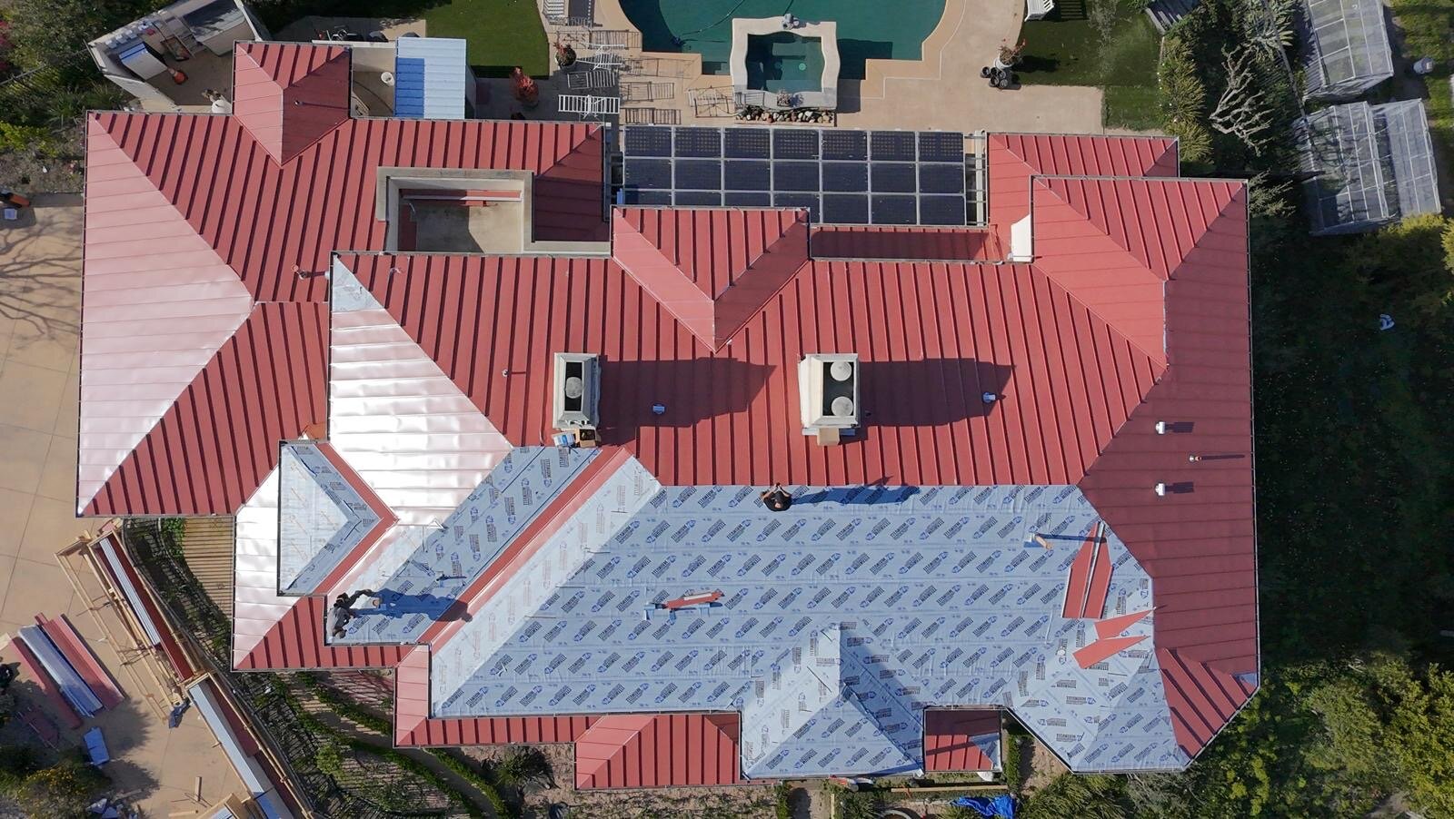 Standing-seam metal roof installation