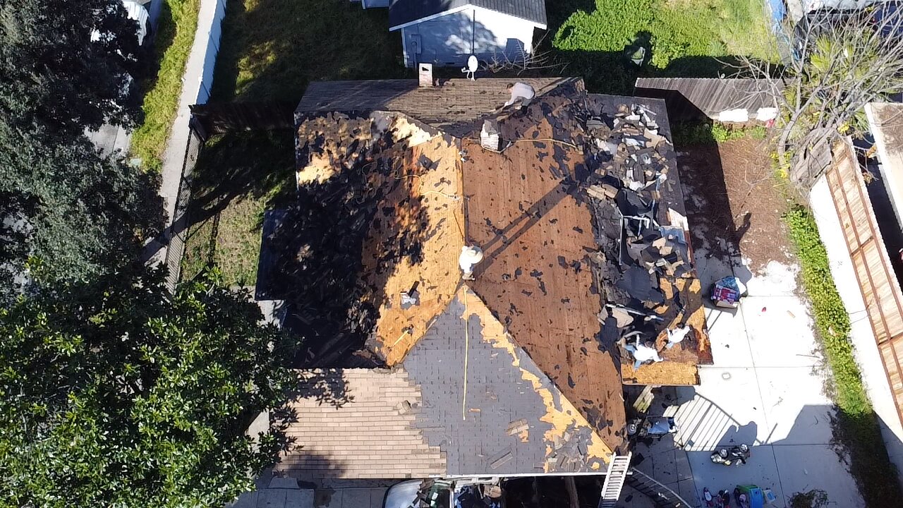 Roof tear-off in progress